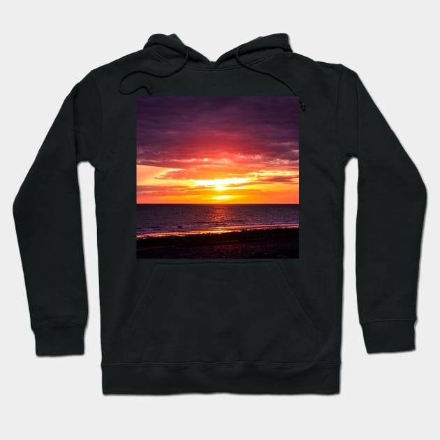 Sunset on the coast of Wales Hoodie by chiaravisuals